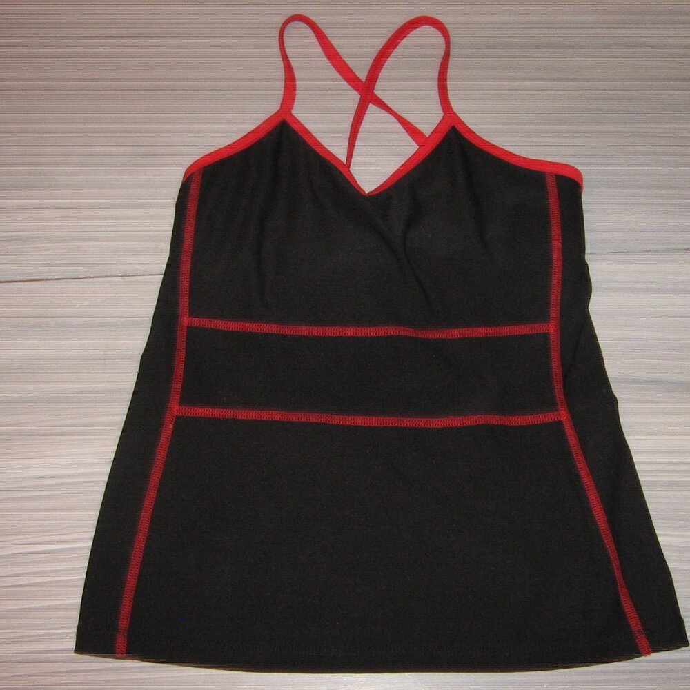 Ladies Activewear Top in Black With Red Trim Size Medium. $5.00 AS AN ADD ON